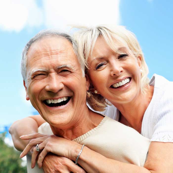 happy senior couple at weight crafters