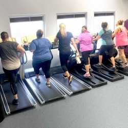 A group of weight loss camp clients doing some morning cardio at Weight Crafters.